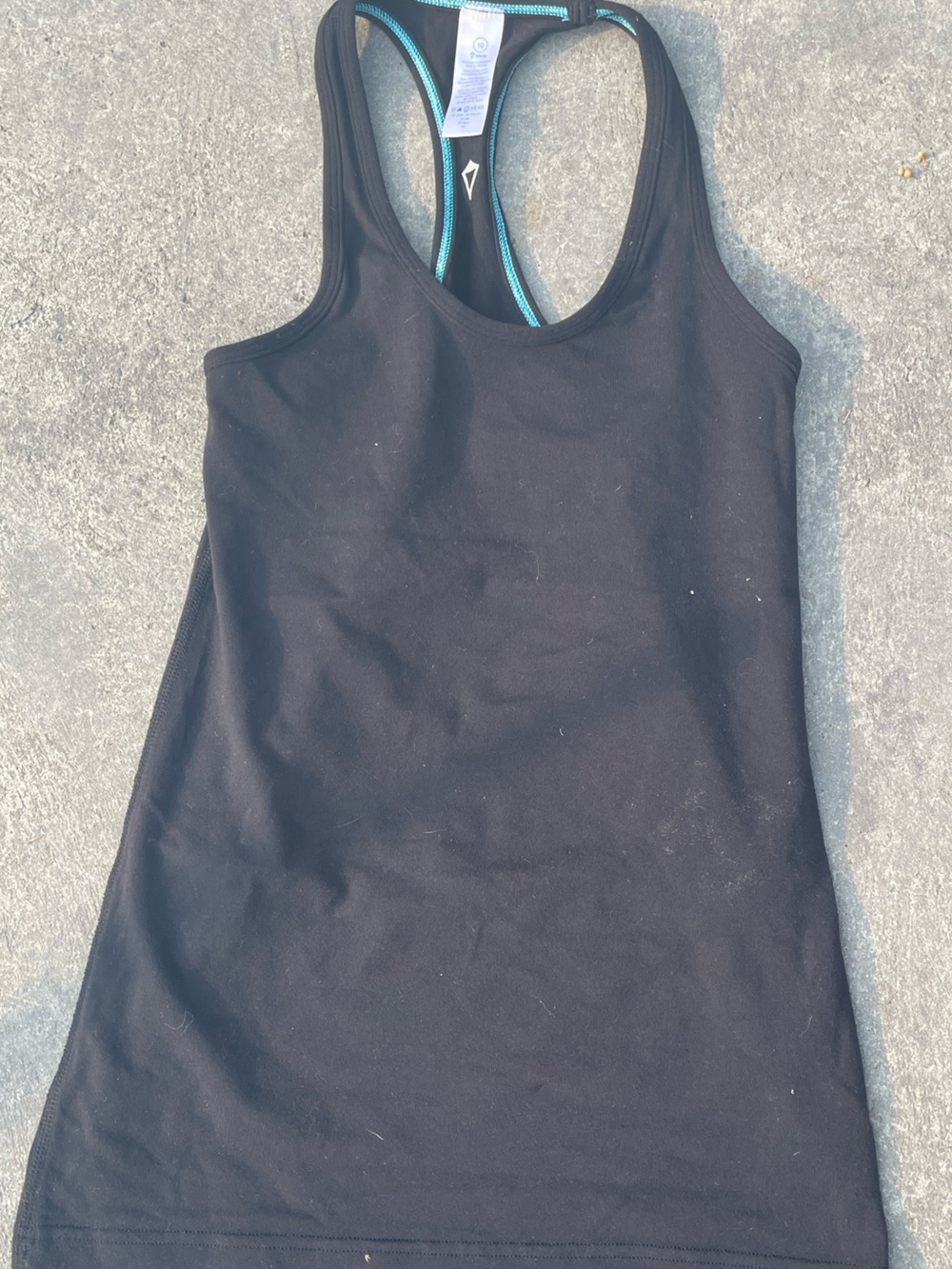 Ivivva Black Racerback Tank with Teal lining inside